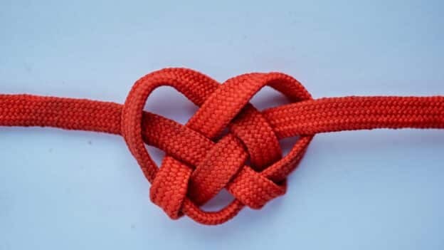Rahab's red rope of salvation, the scarlet thread of redemption, sent down from her house in Jericho