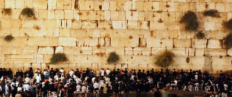 Praying the Shema Israel prayer at the Western Wall