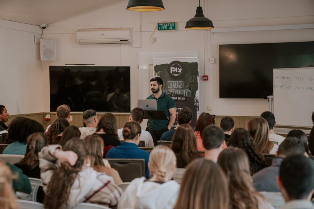 Eli Haitov ministers to soldiers to build them up in their faith
